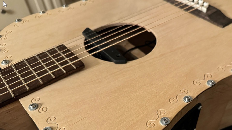 Folded Horn Acoustic Guitar U.S. Patent # 10,777,172
